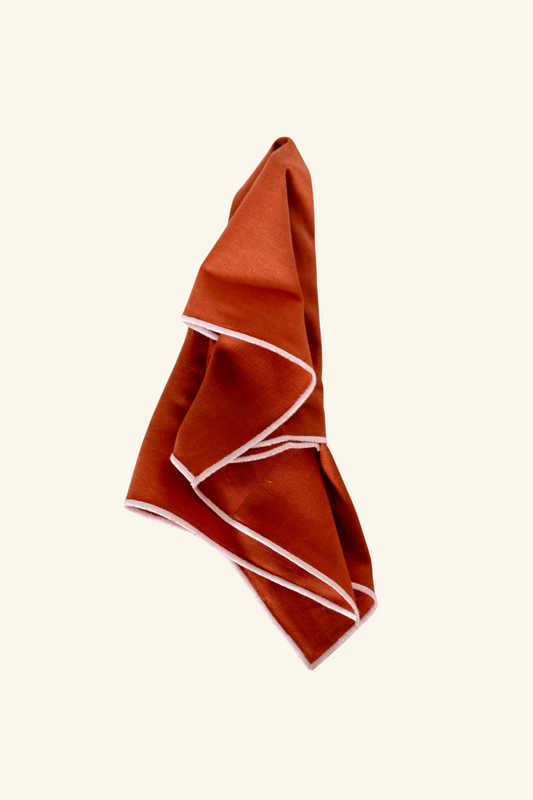 Line Napkin - Rust/Salmon Piping